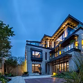 Modern Detached Villa Exterior Design With Large Windows Glass Balcony Evening Lighting And Greenery