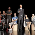 Diverse Group of People in Various Poses with Man in Suit Shopping Bags and Bicycle