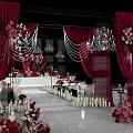 Banquet Hall Decorated For Wedding Party With Pink Floral Decor Chandeliers And Petals