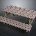 Sturdy Outdoor Wooden Picnic Table With Slatted Top And Attached Benches
