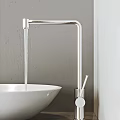 Modern Bathroom Faucet with Sleek Design and White Basin in Contemporary Style