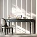 Black Desk With Patterned Chair Photo Frames Lamp Books Cup And Light Shadow Background