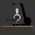 White And Black Headphones On Black Stand With Wooden Platform And Cable