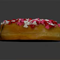 Delicious Donut Topped with Pink Frosting and Red White Heart Shaped Sprinkles