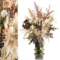 Natural Dried Flower Arrangement In Green Glass Vase With Beige Brown Blooms And Leaves