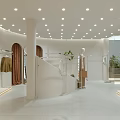 Stylish White Toned Clothing Store Interior With Mannequin Display Racks And Brown Curtains