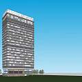 Modern High Rise Office Building With Glass Facade And Trees Under Blue Sky