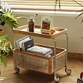 Wooden Two Tier Coffee Table With Rattan Basket Wheels Coffee Grinder Magazine Lemon And Plants