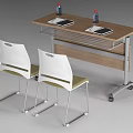 Office Desk With Wooden Top Metal Wheels Two Laptops Beverages And Two White Back Chairs