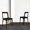 Modern Leisure Chairs in Brown and Black with Light Striped Wall and Wooden Floor
