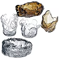 Artisan Crafted Ceramic Bowls And Cups With Unique Textured Surfaces And Shapes