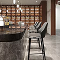 Modern Bar Counter Interior With Marble Top Wine Racks And Pendant Lights