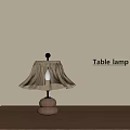 Wooden Base Table Lamp with Beige Fabric Shade on Wooden Table and Warm Light