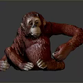 Realistic Red Orangutan Statue Sitting With Detailed Textured Surface On Gray Background