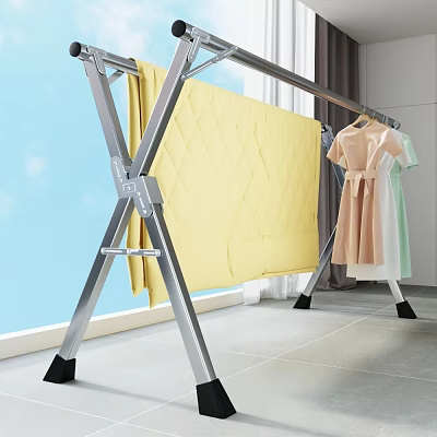 Metal Clothes Drying Rack With Yellow Quilt Pink Dress And Green Clothes Indoor 3d model