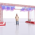 Event Entrance Arch With Red Frame Colorful Hanging Streamers Side Ladders And Person