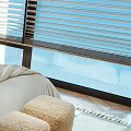 Double Bed Bedroom Interior With Bedspread Pillows Nightstand Lamp Blinds And Sunlight