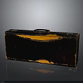 Vintage Leather Suitcase With Black And Orange Worn Texture And Retro Design For Storage
