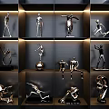 Modern Metal Sculptures In Various Poses On Indoor Display Shelves With Lighting