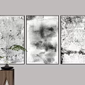 Three Abstract Paintings Grayscale Textured Wall Art Hung On Wall With Potted Plant