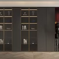 Elegant Modern Dark Gray Bookcase With Glass Doors Golden Frames And Decor Items
