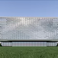 Modern Sales Office Building With Geometric Metal Grid Facade And Green Lawn