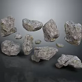 Textured Gray Natural Stone Pieces Displayed On Dark Background With Various Shapes And Sizes