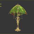 Decorative Table Lamp With Intricate Black Metal Base And Green Stained Glass Shade