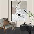 Gray Single Seater Sofa With Abstract Painting Glass Coffee Table And Green Plant