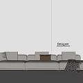 Cream Three Seater Sofa with Cushions Brown Throw Blanket Side Table Lamp and Designer Wall