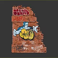 Red Brick Wall Featuring Colorful Graffiti Blue Cartoon Character And Yellow Objects