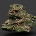 Natural Stacked Stone Formation With Mossy Surface And Varied Brown Green Color Tones