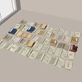 Open Books and Magazines Scattered on Light Colored Tabletop With Various Colors