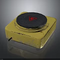 Yellow Square Base Electrical Heating Plate With Black Circular Panel And Red Triangular Warning Sign