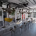 Cozy Leisure Lounge Area With Comfortable Seating Green Plants And Pendant Lights
