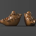 Two Golden Buddha Sculptures With Smiling Expressions And Lotus Leaf Bases