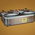 Vintage Open Reel Tape Recorder Classic Household Appliance with Metal Control Panel and Knobs