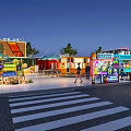 Colorful Commercial Street With Vibrant Storefronts Pedestrians Walking And Bright Signboards