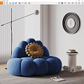 Cloud Shaped Blue Single Sofa With Side Table Books Wall Decorative Painting And Floor Lamp
