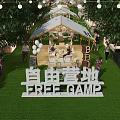 Vibrant Commercial Street with Tents String Lights and Green Grass at Free Camp
