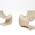 Light Wood Single Chair with Modern Curved Lines and Sleek Minimalist Design