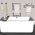 Modern White Freestanding Bathtub in Minimalist Bathroom with Towel Rack and Bath Products