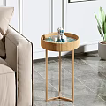 Modern Round Rattan Side Table With Gold Metal Legs And Decorative Ornament