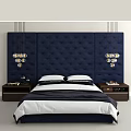 Elegant Double Bed With Navy Tufted Headboard Pendant Lights Nightstands And Bed Linens
