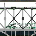 Steel Truss Bridge Carries Cars And High Speed Train At Golden Sunset Over Calm River