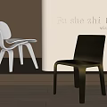 Modern Minimalist Leisure Chairs in Light and Dark Tones for Indoor Display with Soft Shadows