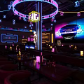 Modern Bar Interior Design With Neon Lights Purple Lighting Bar Counter And Tables Chairs