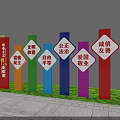 Colorful Vertical Garden Ornaments With Values Text Displayed On Green Lawn Grass