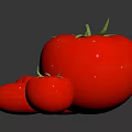 Red Tomato Decorative Ornament Collection with Glossy Surface and Reflective Display for Modern Home Decor