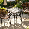 Sunny Outdoor Metal Mesh Table With Woven Rattan Chairs In Garden Patio
